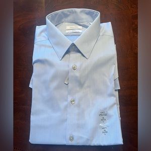 Men’s dress shirt. Brand new. Calvin Klein light blue